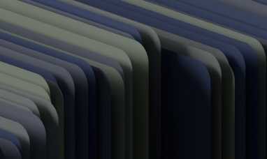Row of binders arranged side by side, ordered by year.