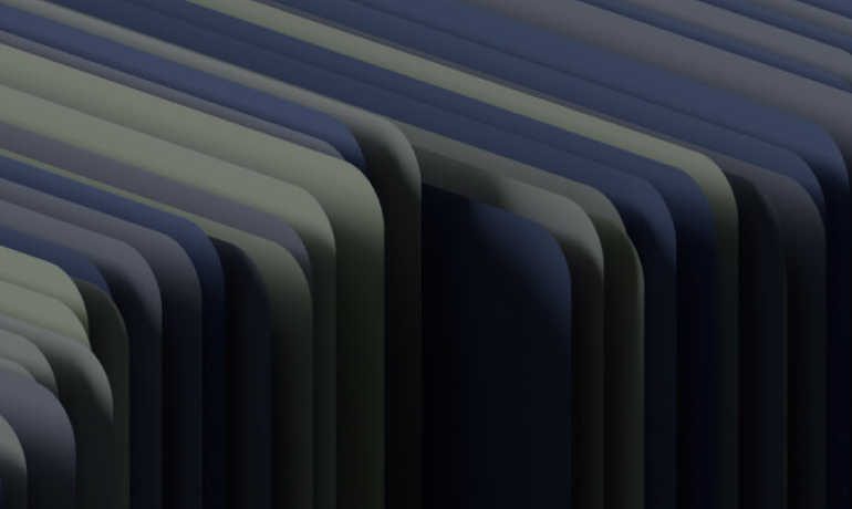 Row of binders arranged side by side, ordered by year.