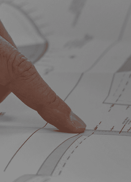 Hand consulting a technical document
